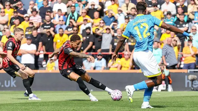Marcus Tavernier shoots for Bournemouth against Wolves in the Premier League