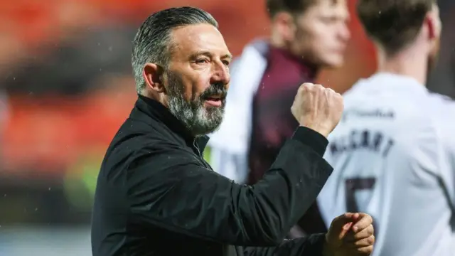 Hearts head coach Derek McInnes celebrates