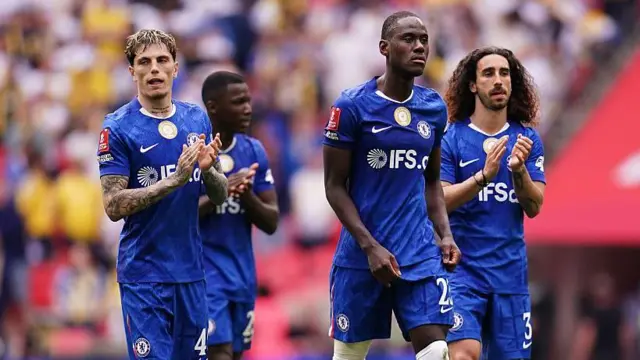 Chelsea players applauding after defeating Leeds United in the FA Cup