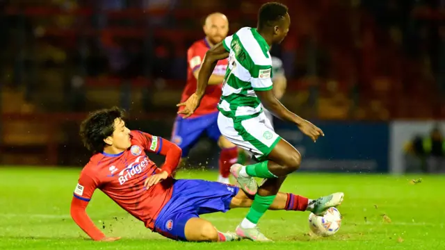 Jed Meerholz makes a tackle for Aldershot against Yeovil