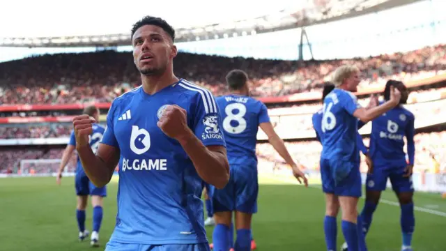 James Justin of Leicester City celebrates scoring his team's second goal during the Premier League match between Arsenal FC and Leicester City FC at Emirates Stadium