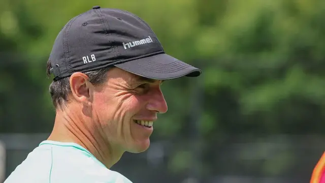 Regis le Bris watches the players during a Sunderland training session