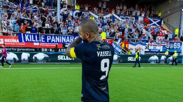 Killie captain Kyle Vassell applauds the fans at full-time