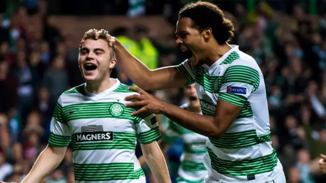 James Forrest celebrates with Virgil van Dijk after scoring for Celtic against Ajax