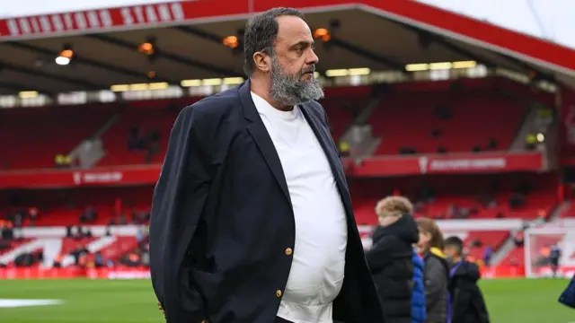 Nottingham Forest owner, Evangelos Marinakis, on the pitch before the Premier League match against Crystal Palace at the City Ground