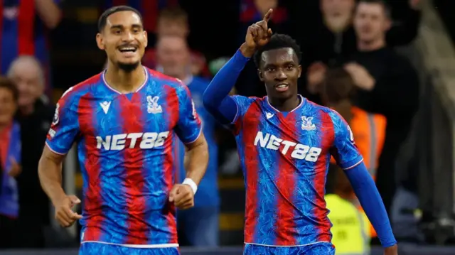 Crystal Palace players celebrate their win against Woles