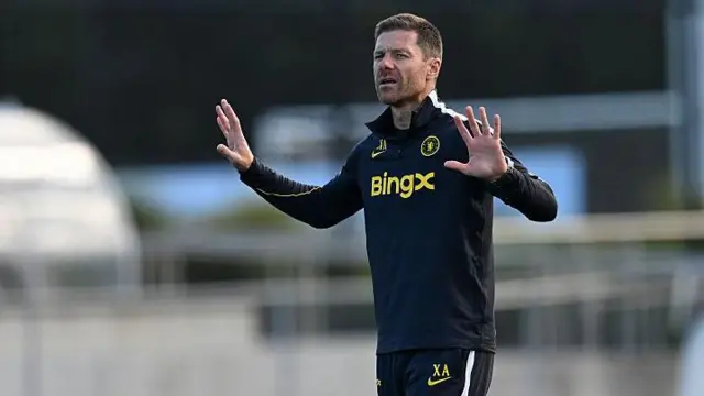 Xabi Alonso takes a training session