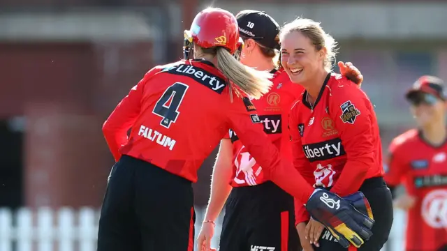 Alice Capsey of Melbourne Renegades celebrates a wicket with team-mates