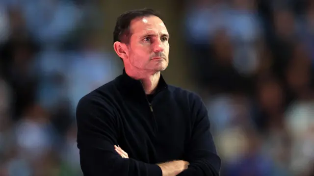 Frank Lampard watching Coventry with his arms folded