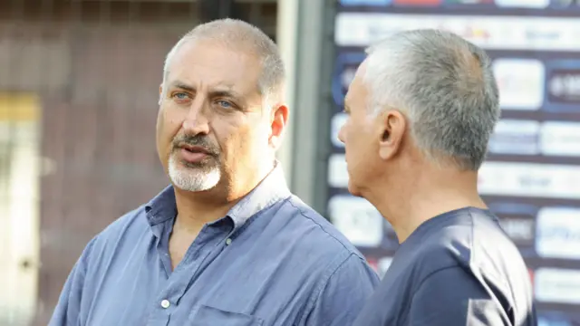 Napoli scouting manager Maurizio Micheli (left) talks to the Napoli's sport director Mauro Meluso