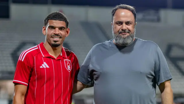 Morgan Gibbs-White with Evangelos Marinakis