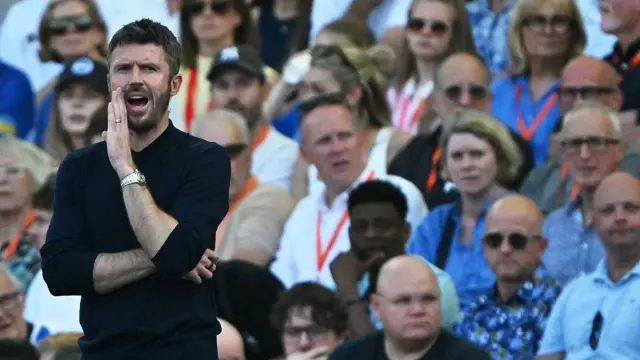 Michael Carrick on the touchline