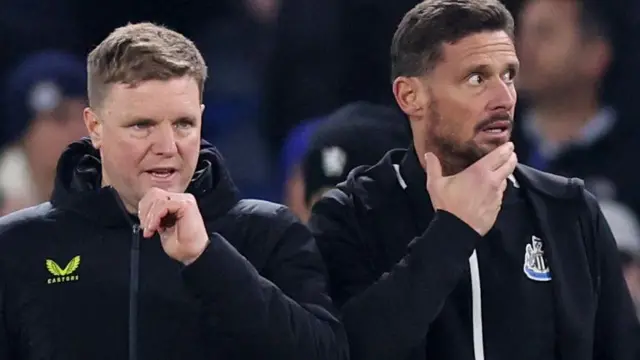 Eddie Howe stands on the touchline with Jason Tindall