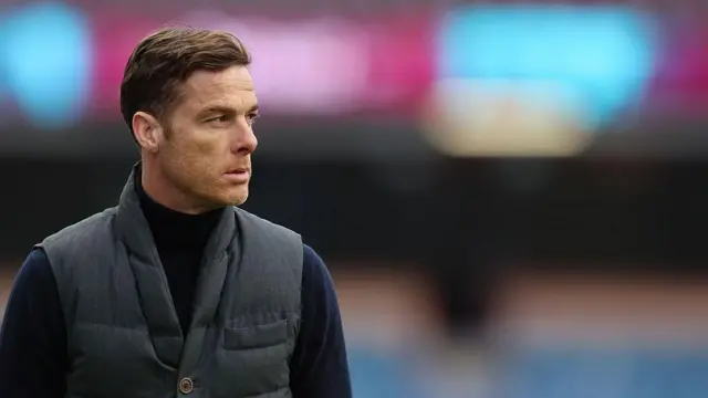 Scott Parker looks on from the touchline