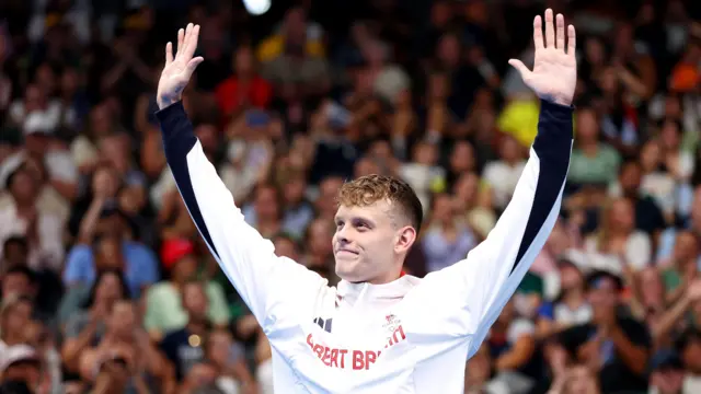 Matt Richards celebrates winning silver in the men's 200m freestyle