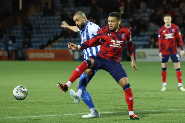 Kyle Vassell battles James Tavernier