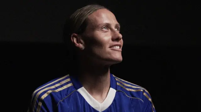 Emily van Egmond poses in the Leicester City shirt