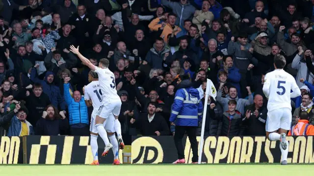 Leeds players celebrate against Tottenham