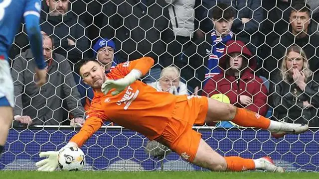 Jack Butland making a save for Rangers