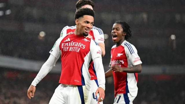 Ethan Nwaneri celebrates after scoring for Arsenal