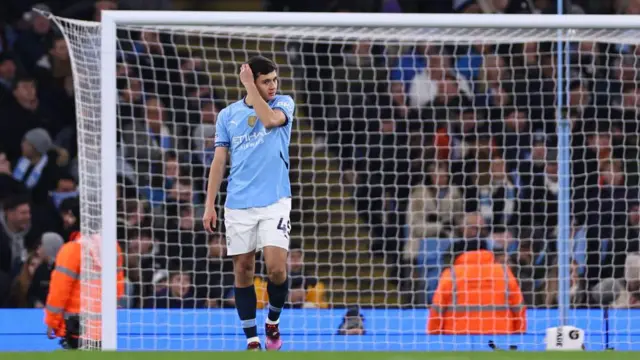 Abdukodir Khusanov of Manchester City reacts