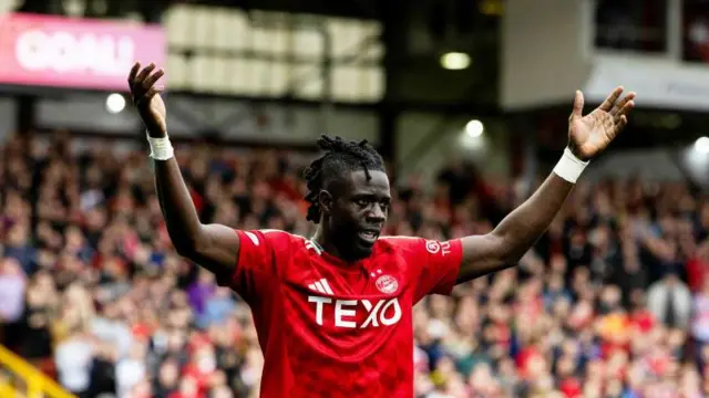 ABERDEEN, SCOTLAND - SEPTEMBER 14: Aberdeen’s Pape Gueye celebrates scoring to make it 2-0 during a William Hill Premiership match between Aberdeen and Motherwell at Pittodrie Stadium on September 14, 2024, in Aberdeen, Scotland. (Photo by Craig Foy / SNS Group)