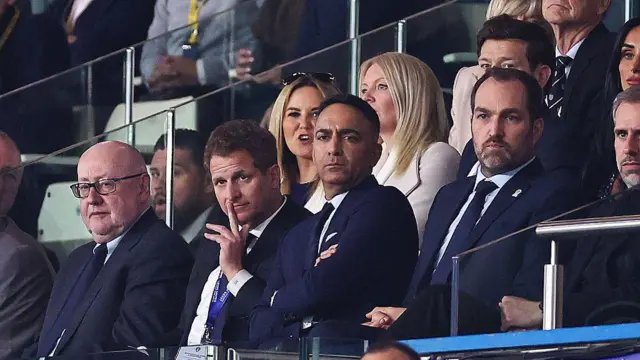 Paraag Marathe sits in the stands at Elland Road