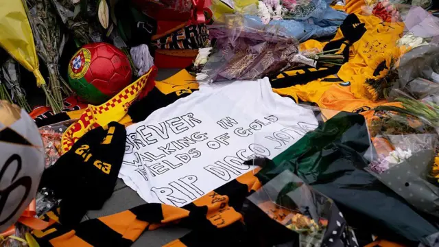 Tribute at Molineux that says 'forever walking in fields of gold'