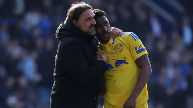 Daniel Farke consoles Junior Firpo following defeat at Portsmouth