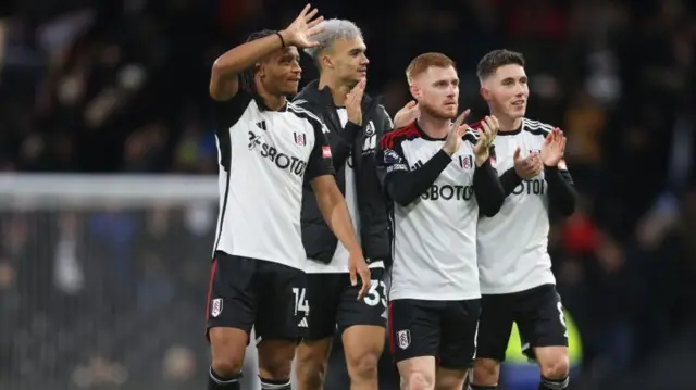 Fulham's Bobby Reid, Antonee Robinson, Harrison Reed and Harry Wilson applauds the fans at the final whistle