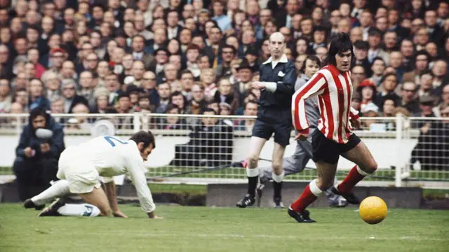 Hughes in action against Leeds