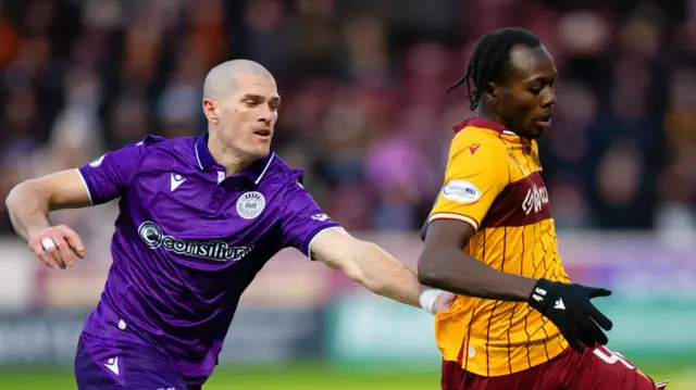 St Mirren's Alex Gogic and Motherwell's Emmanuel Longelo