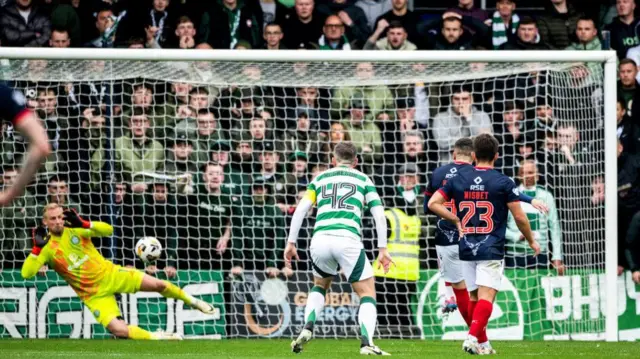 Kasper Schmeichel saved Ronan Hale's penalty, but it was re-taken due to being off his line