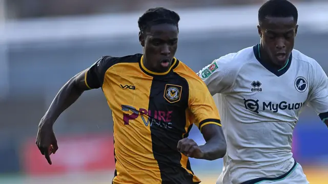 Habeeb Ogunneye drives forward with the ball for Newport County against Millwall