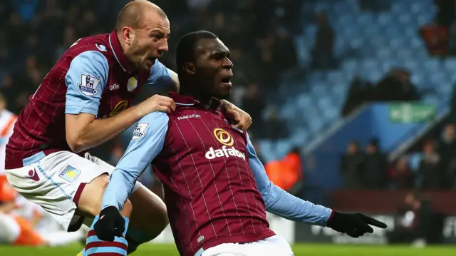 Christian Benteke celebrates a goal while playing for Aston Villa