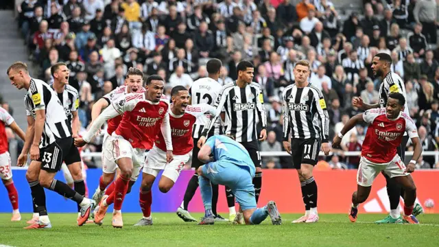 Gabriel of Arsenal celebrates scoring his team's second goal against Newcastle United