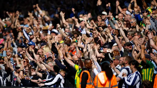 West Brom fans celebrating securing their Championship status