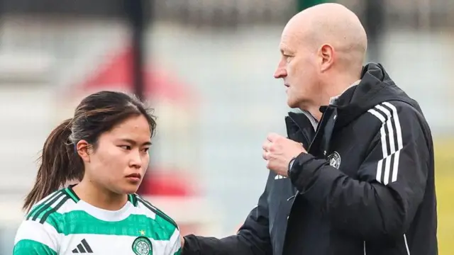 Celtic's Momo Nakao and Grant Scott