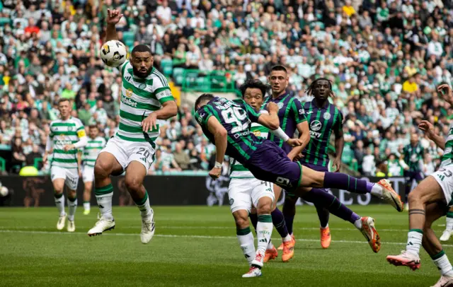 Hibernian's Mykola Kukharevych pulls a goal back with a header to make it 2-1 during a Premier Sports Cup last sixteen match between Celtic and Hibernian at Celtic Park