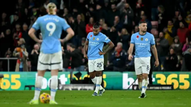 Manchester City's Swiss defender #25 Manuel Akanji reacts after Bournemouth's Brazilian striker #09 Evanilson (not pictured) scores the team's second goal during the English Premier League football match between Bournemouth and Manchester City at the Vitality Stadium