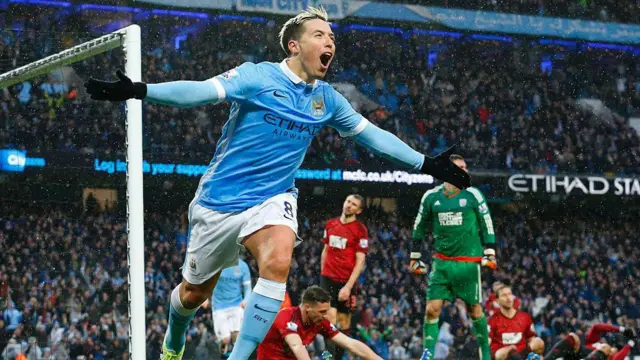 Samir Nasri celebrates for Man City