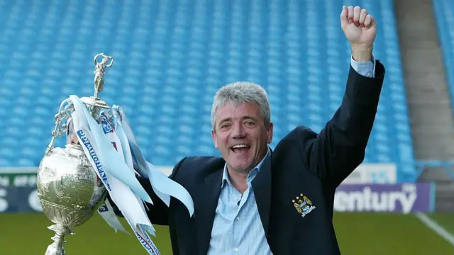 Man City manager Kevin Keegan celebrates winning the First Division Championship