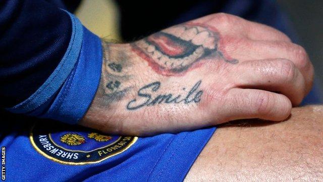 Cummings has a tattoo of The Joker's smile on his hand