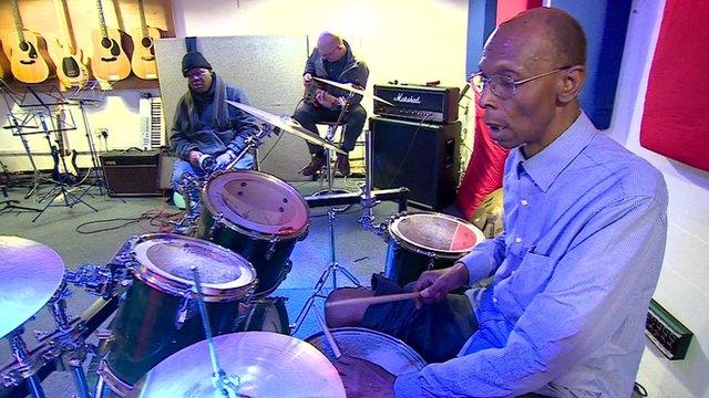 Devon Marston playing the drums