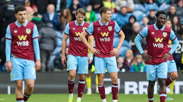 Burnley players react to conceding a second goal during the Premier League match between Burnley FC and AFC Bournemouth