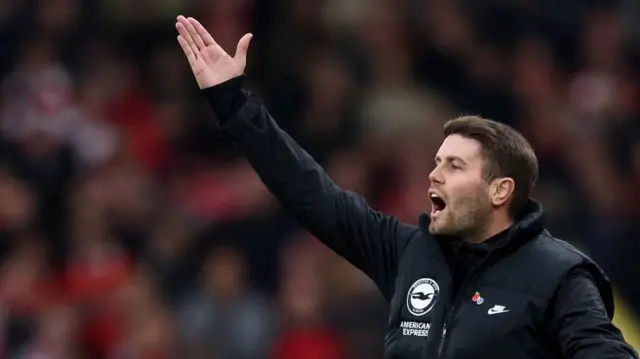 Brighton's German head coach Fabian Hurzeler shouts instructions to the players from the touchline during the English Premier League football match between Liverpool and Brighton and Hove Albion at Anfield