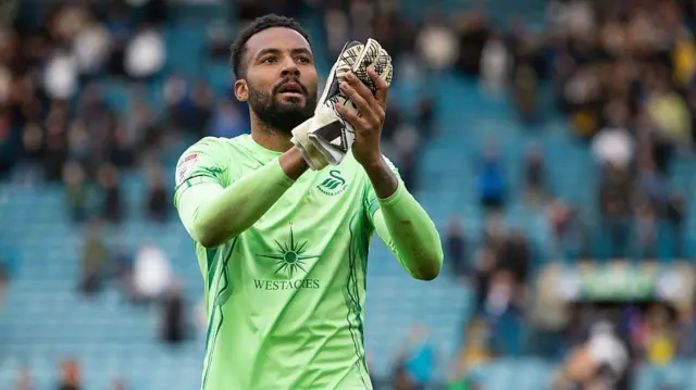 Lawrence Vigouroux celebrates Swansea's draw at Leeds 