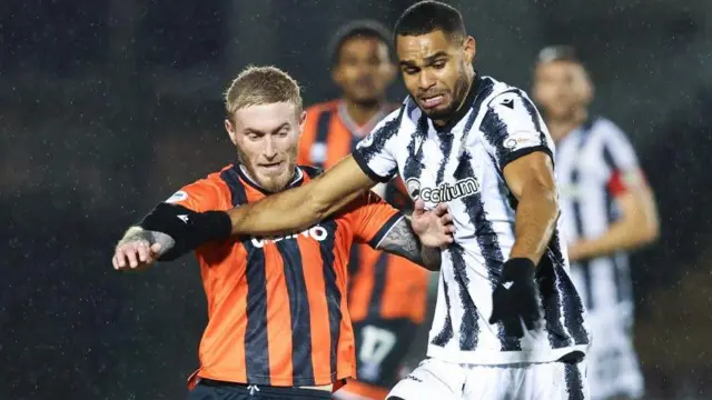St Mirren's Mikael Mandron and Dundee United's Craig Sibbald in action during a William Hill Premiership match between St Mirren and Dundee United at the SMiSA Stadium
