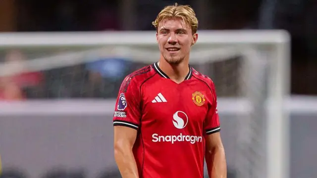 Former Manchester United striker Rasmud Hojlund looks on