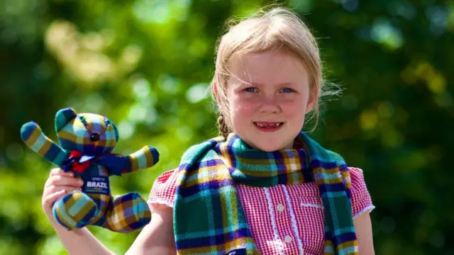 Indie Menzies shows off her prize-winning 'Spirit of Brazil' tartan